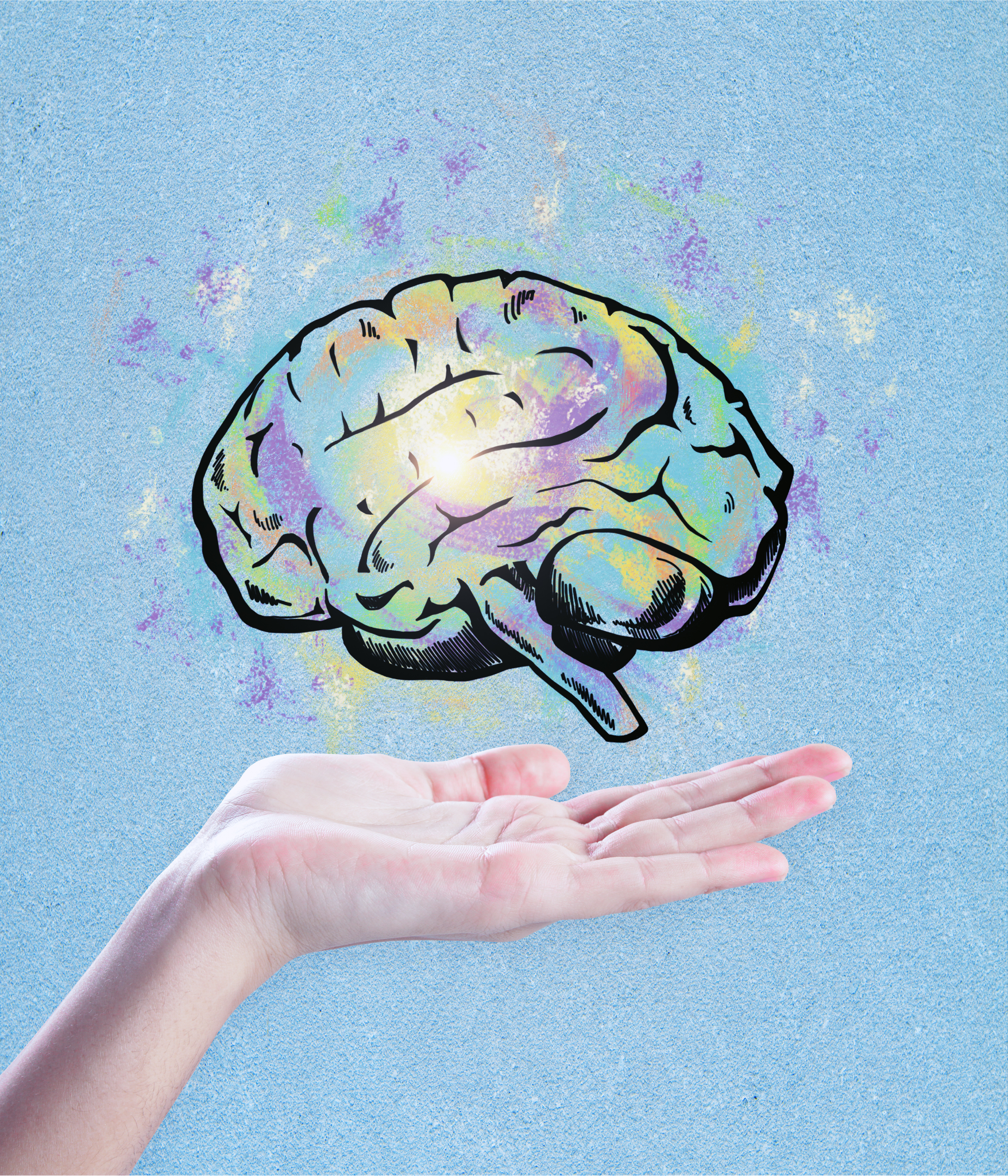 Illustration of a glowing brain above an open hand, representing how ketamine works in the brain