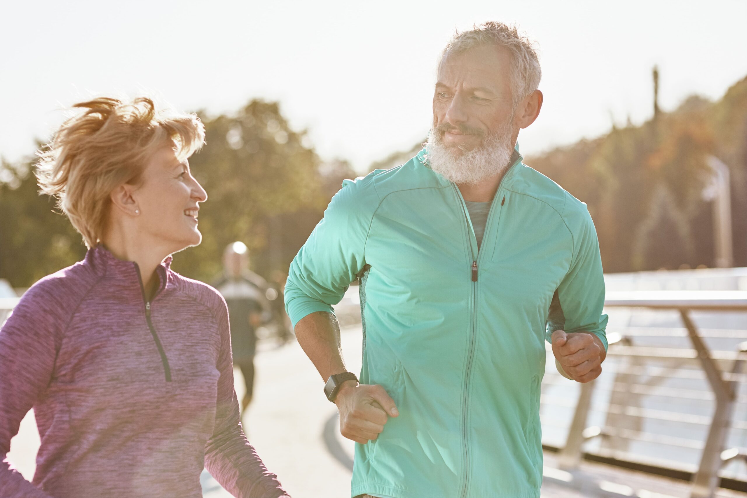 Active senior couple exercising outdoors