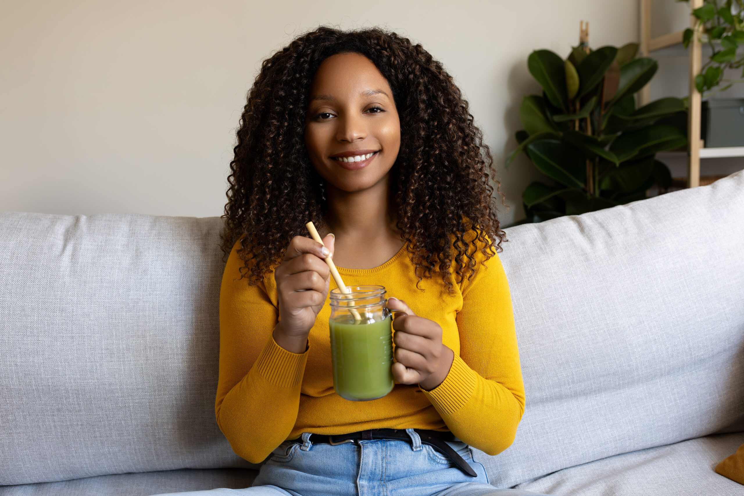 Woman relaxing comfortably at home