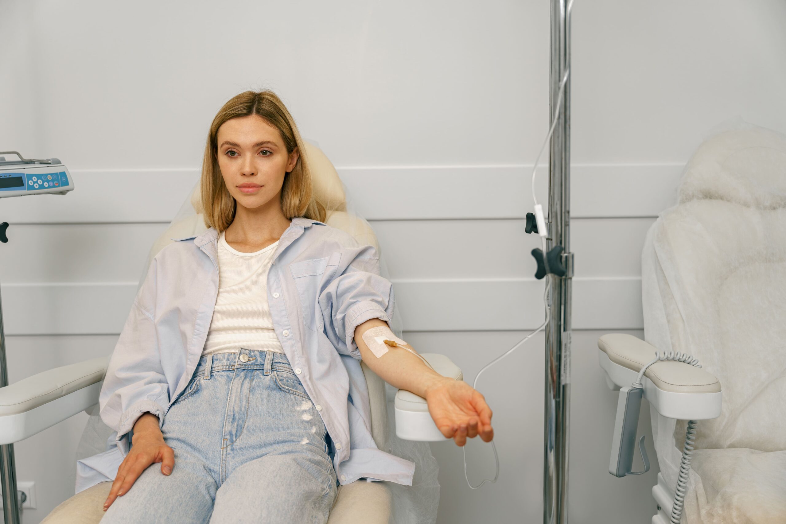Patient receiving Myers’ Cocktail IV therapy in a modern wellness clinic