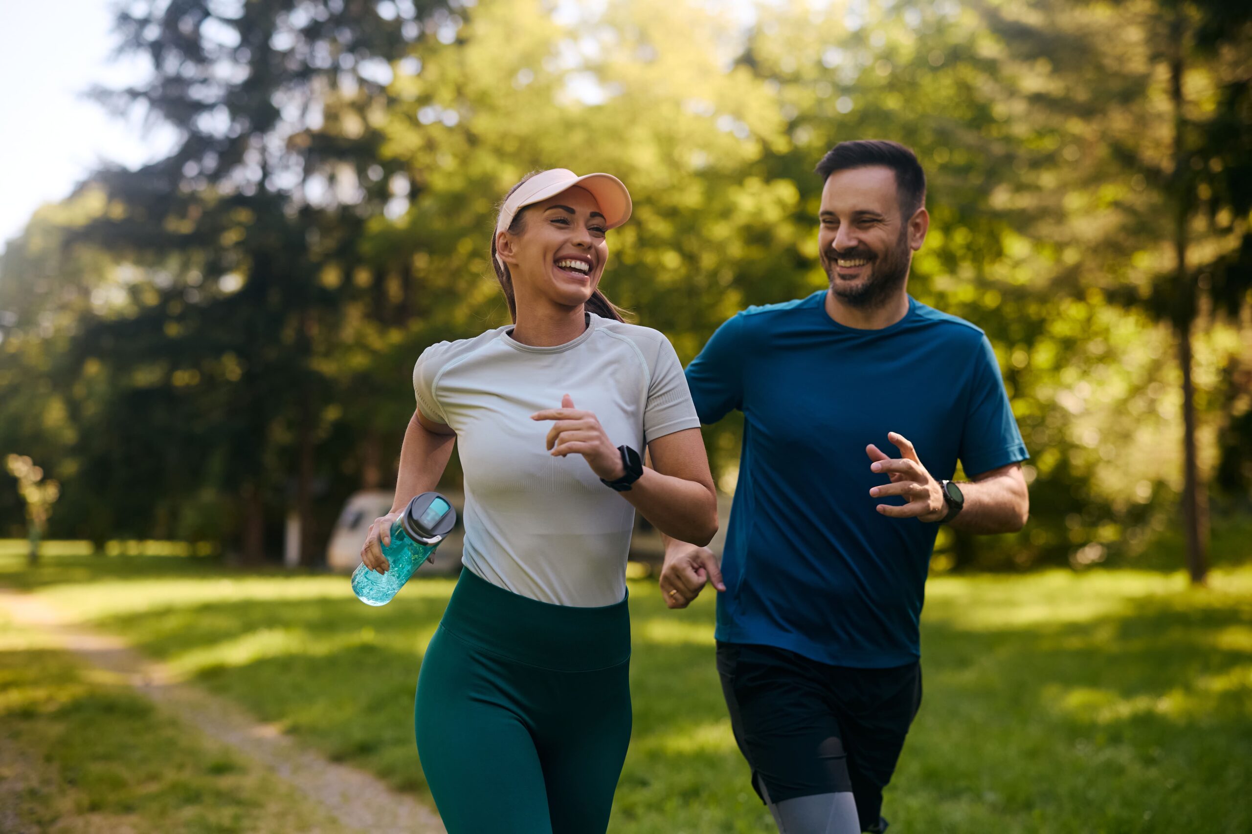 Active couple jogging outdoors
